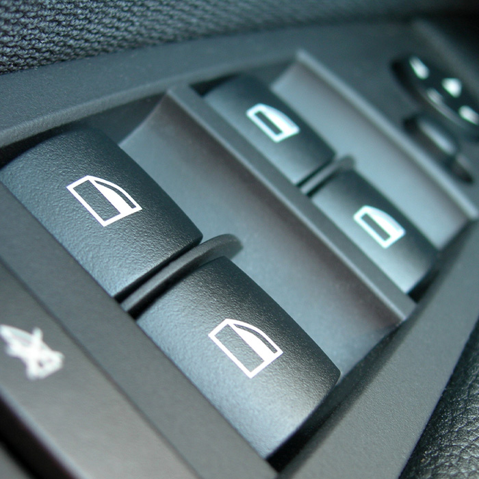Details of a car window buttons