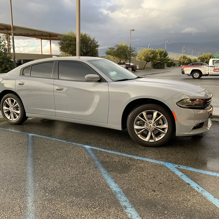 Grey sedan with new glass windows